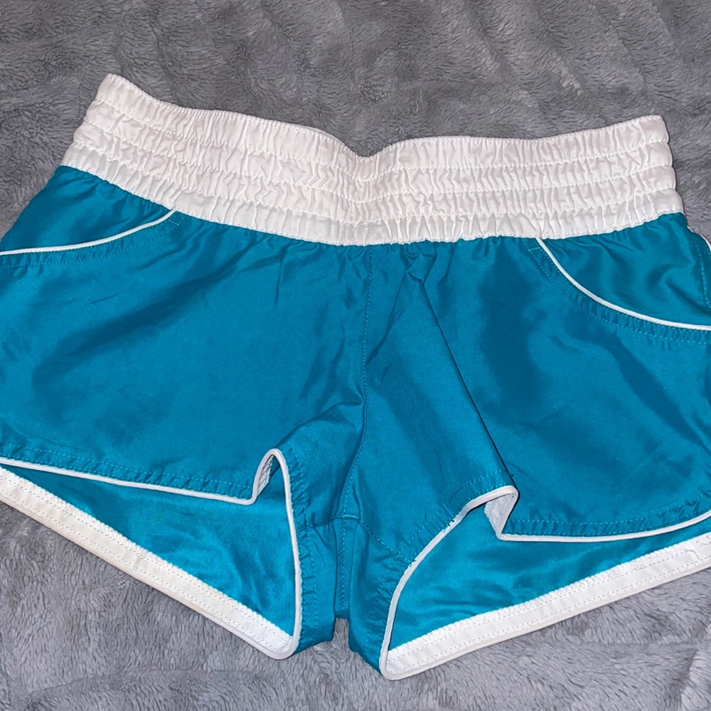Blue athletic shorts. Size S